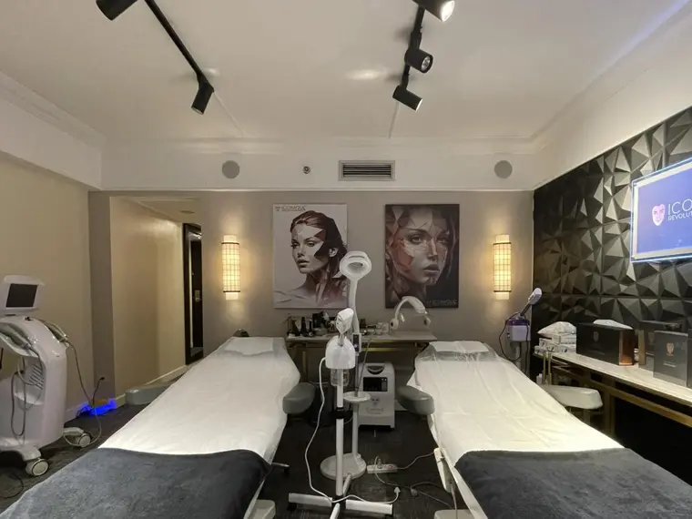 A treatment room with two beds